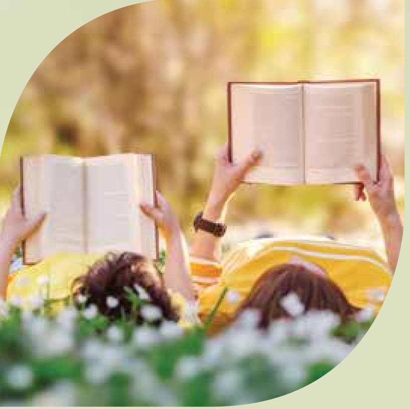 Residents reading books in the garden at Prestige Garden Trails Mira Road Dahisar